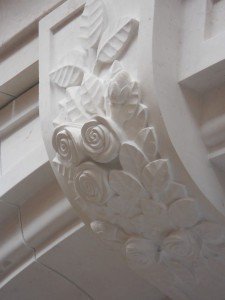Hand carved roses at door surround